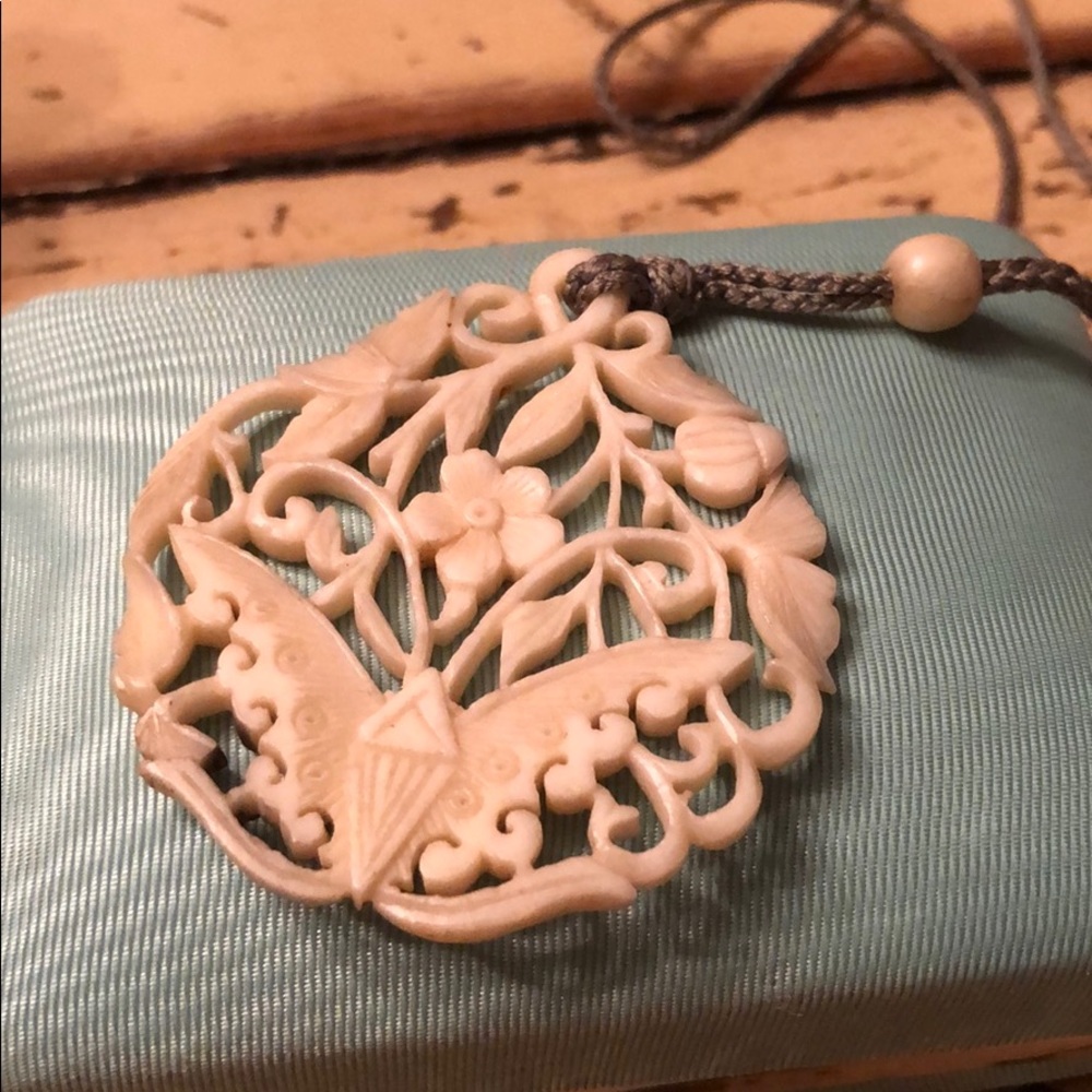 Carved necklace